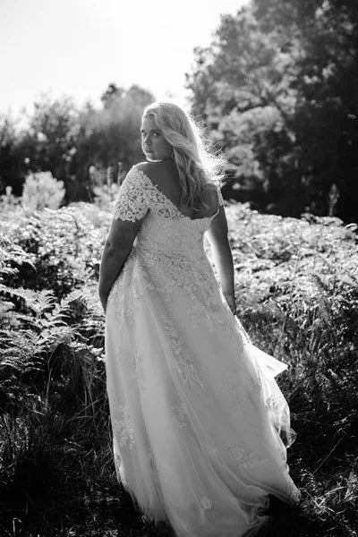Back veiw of a-line wedding dress with lace sleeves