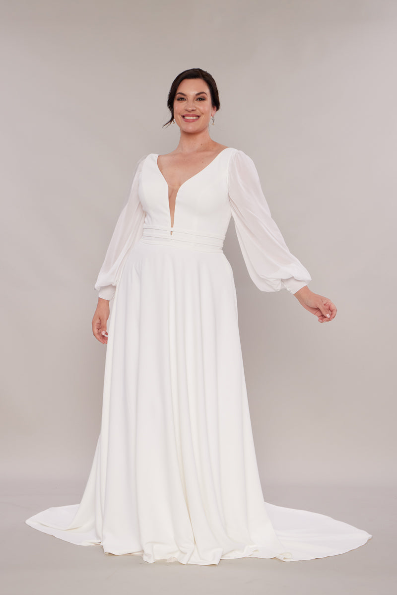 Rita with long bishop sleeves