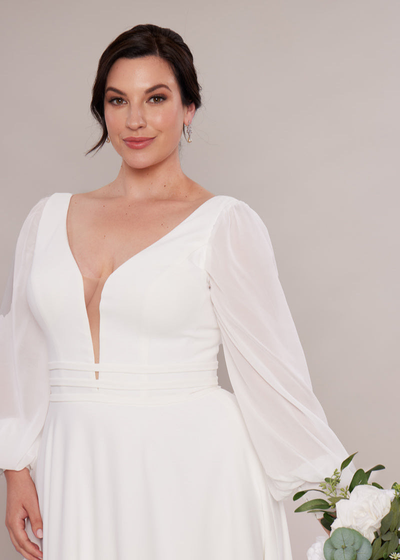 Rita with long bishop sleeves