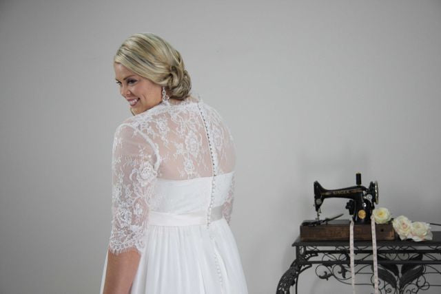 Covered back bridal gown with sleeves