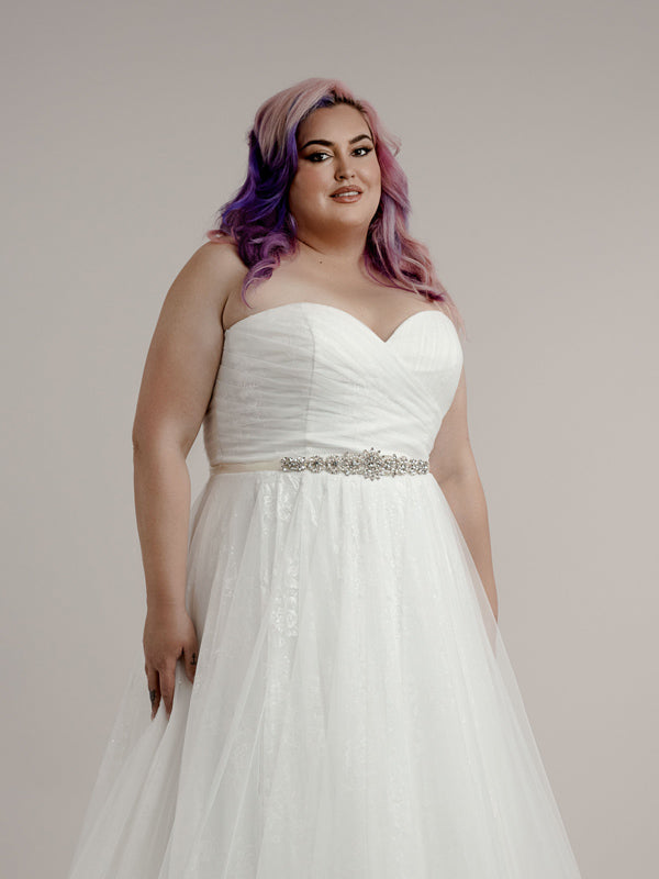 Add a belt to your strapless bridal gown