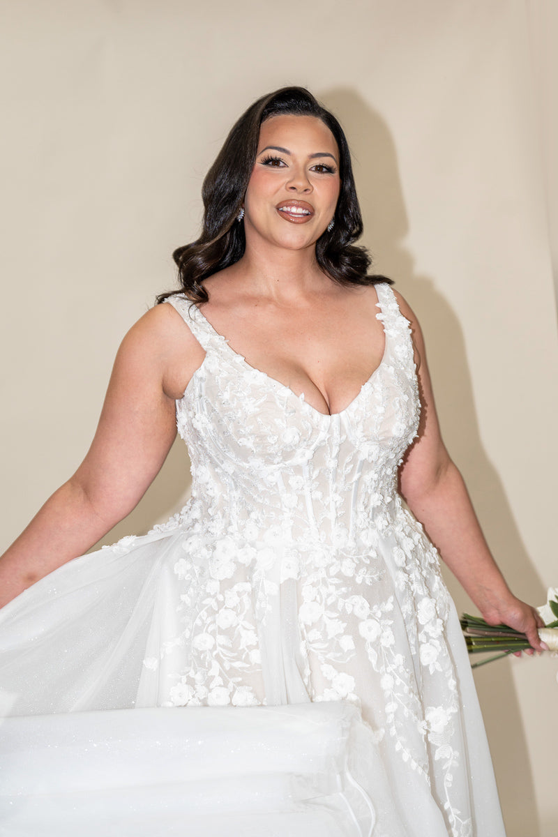 Close-up of Tiana corset bodice with visible boning and  floral lace