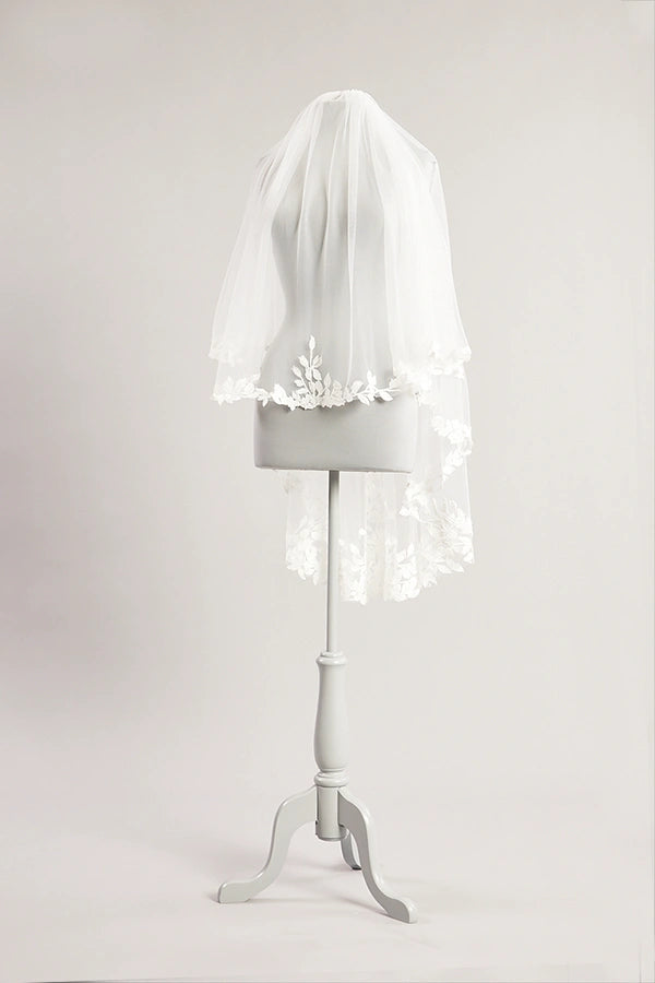 Pale ivory double fingertip lace edge veil