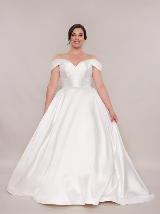 Ballgown wedding dress with off the shoulder detail and a full skirt.