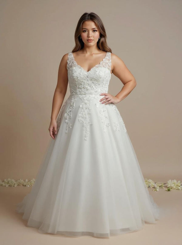 woman wearing an ivory lace wedding dress without a train.