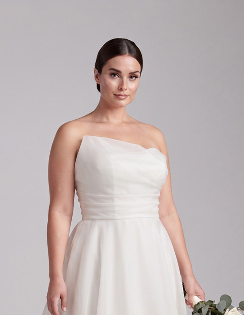 Addie plus size organza wedding dress with asymmetrical neckline and ruched bodice