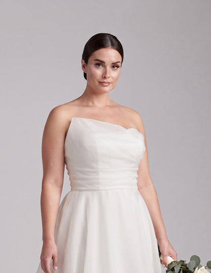 Addie plus size organza wedding dress with asymmetrical neckline and ruched bodice