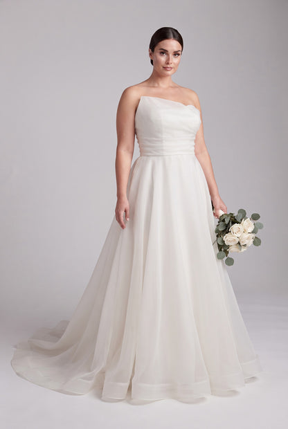 Full-length Addie plus size organza wedding dress with A-line skirt and train