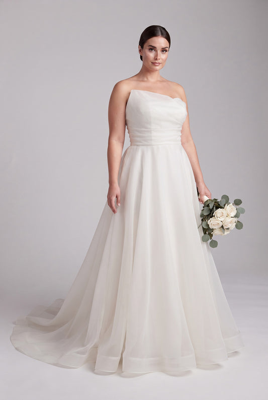 Full-length Addie plus size organza wedding dress with A-line skirt and train