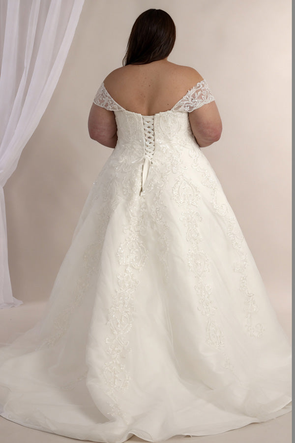Back view of lace ballgown bridal gown with off the shoulder sleeves