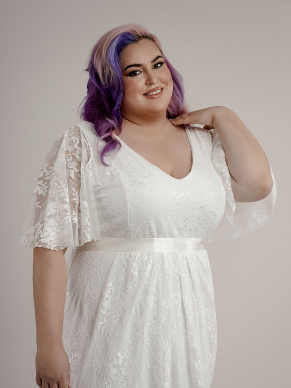 Boho wedding dress with flutter sleeves in plus sizes