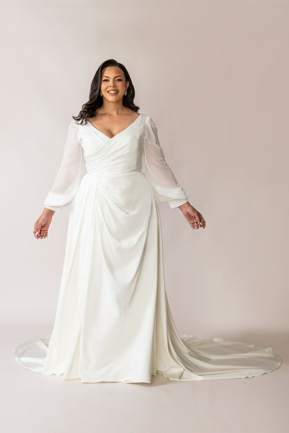 Full-length view of the Valentina ivory crepe wedding gowns