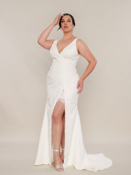 Ora Mermaid wedding dress with a split skirt and made from bridal satin