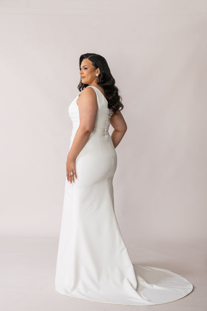 Back view of Ora satin wedding dress with a manageable bridal train
