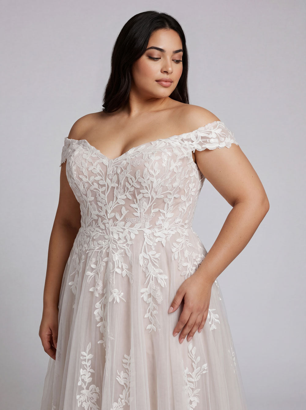 Periwinkle lace plus size wedding dress with soft tulle train and delicate beaded floral lace detail