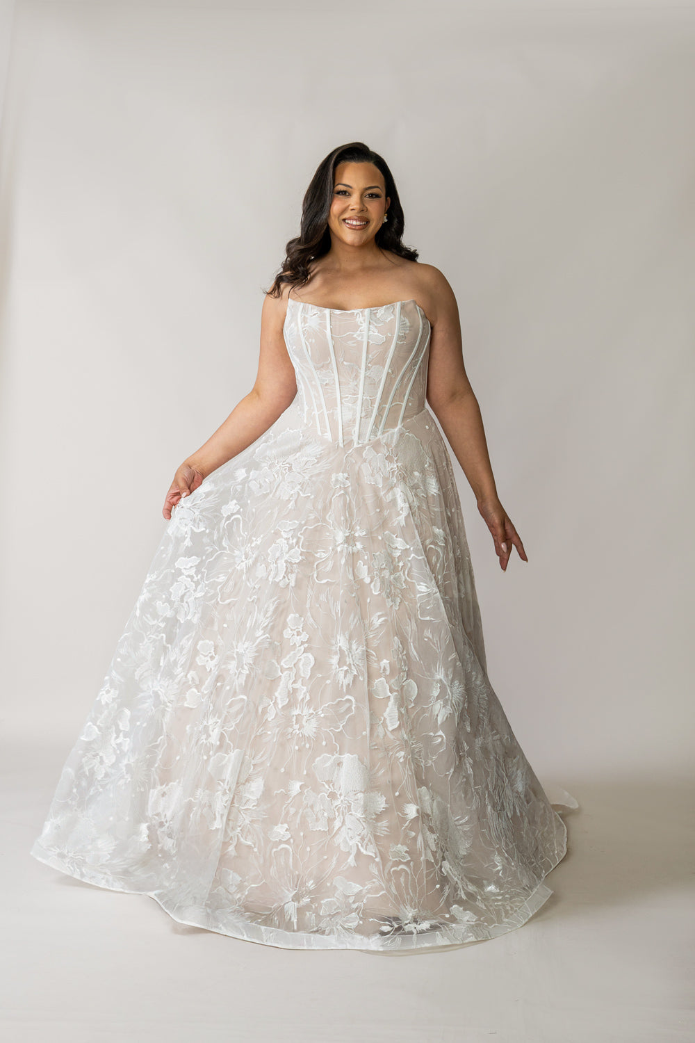 Evie plus size Basque waist wedding dress in romantic ivory lace