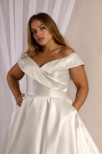 Close up of Romy off the shoulder neckline in mikado satin