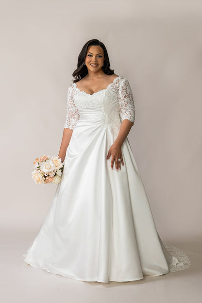 Priya plus size satin and lace wedding dress with elbow-length sleeves