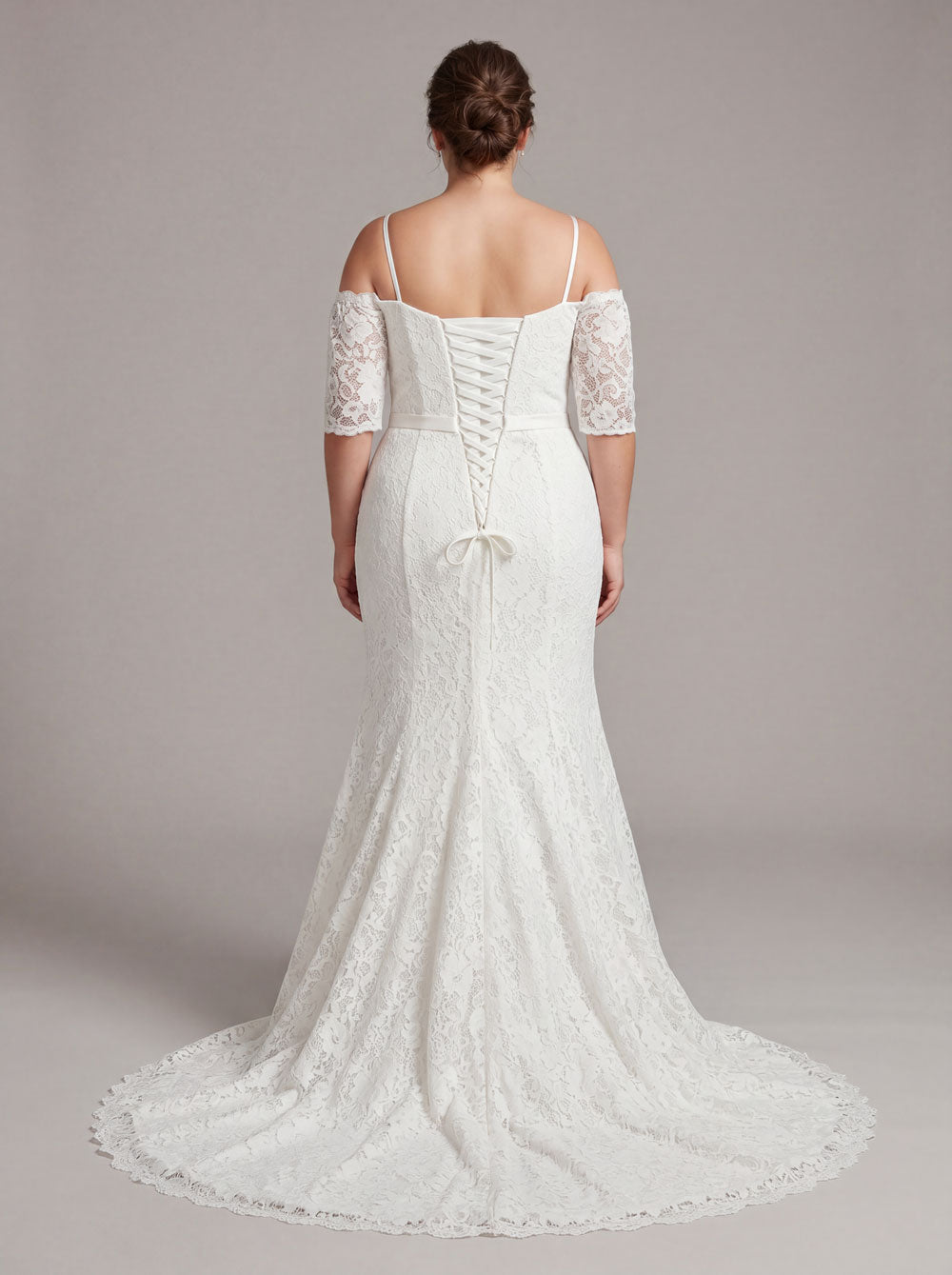 Ivory fitted lace sample wedding gown in size 22 back view