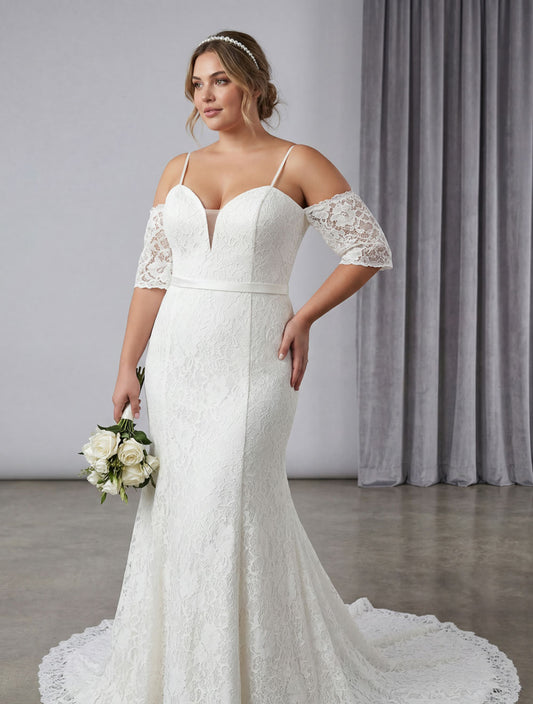 Size 22 lace fitted sample sale wedding gown with sleeves worn by bride