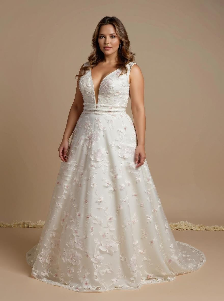 bride wearing ivory and pink wedding dress