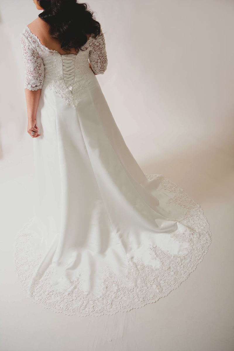 Priya wedding dress corset back with statement lace-trimmed satin train